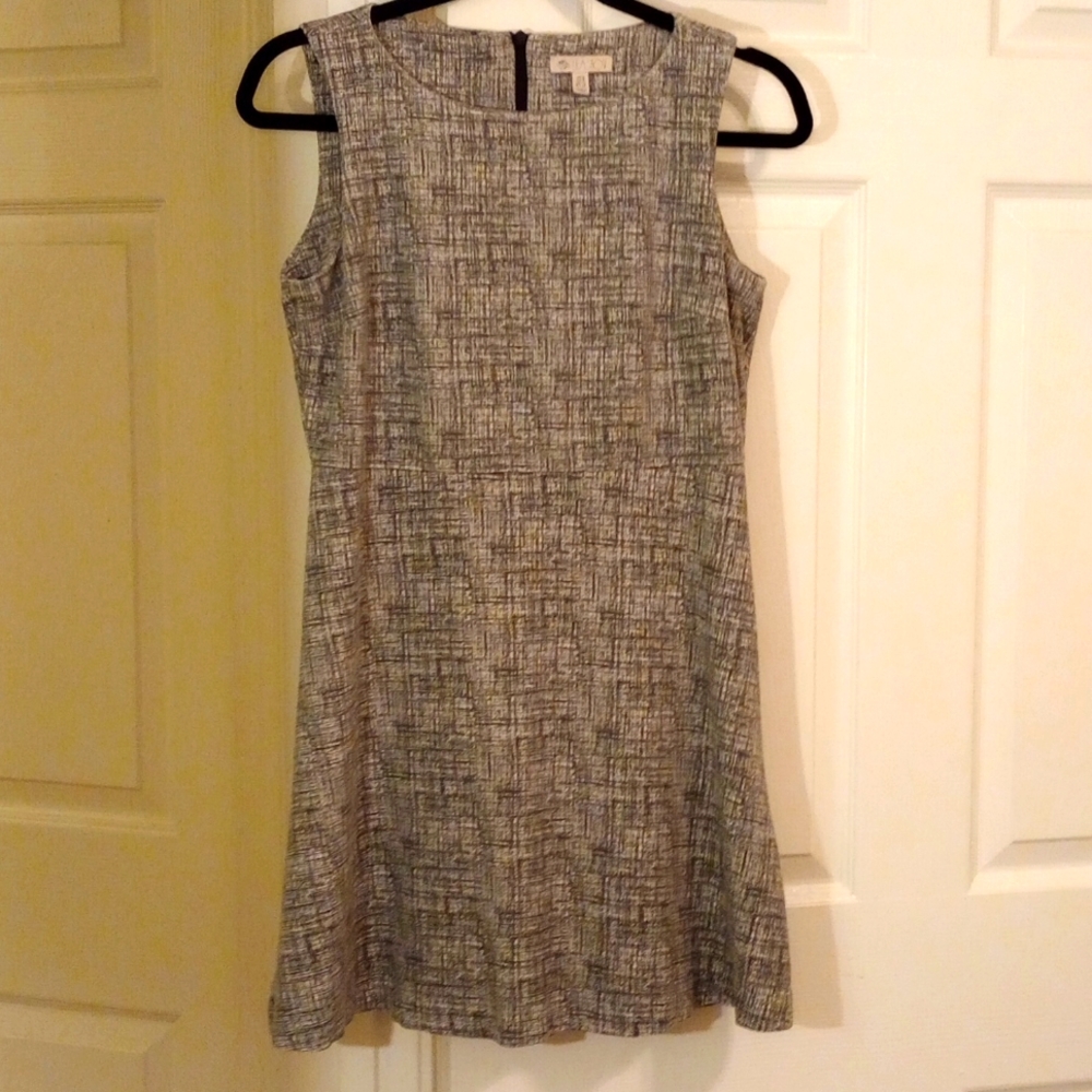 Lila Rose dress very neutral can wear with many different outfits.